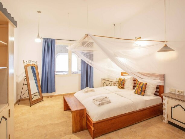 Imagen de la habitación del Hotel King Fisher Village. Foto 15