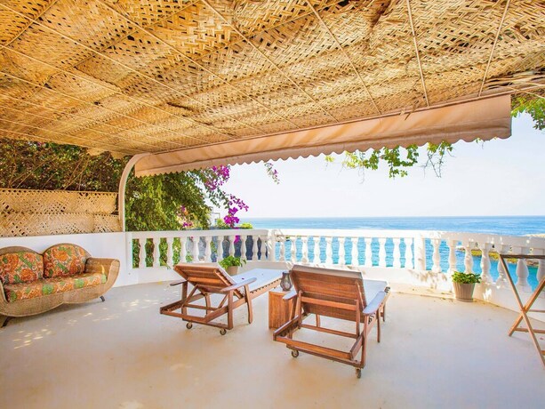 Imagen de la habitación del Hotel King Fisher Village. Foto 19