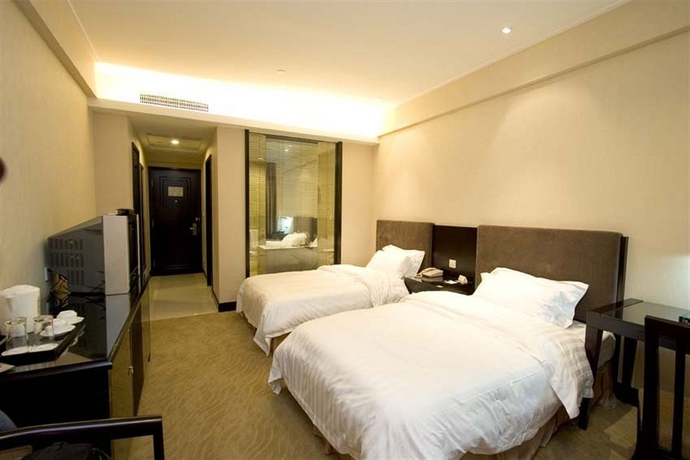 Imagen de la habitación del Hotel King Garden, Guangzhou. Foto 4