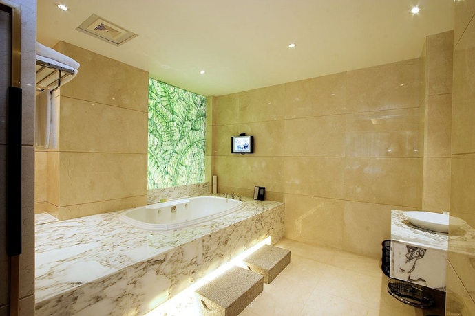 Imagen de la habitación del Hotel King Garden, Guangzhou. Foto 9