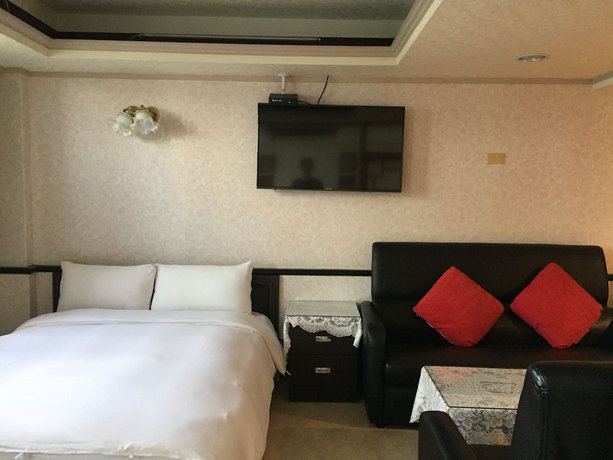 Imagen de la habitación del Hotel King Lo Tung. Foto 7