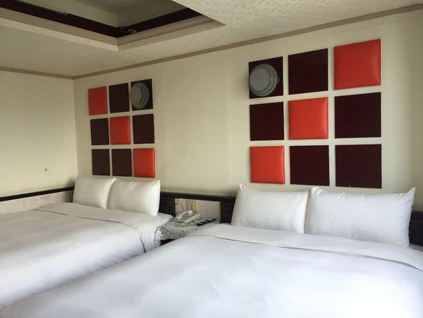 Imagen de la habitación del Hotel King Lo Tung. Foto 14