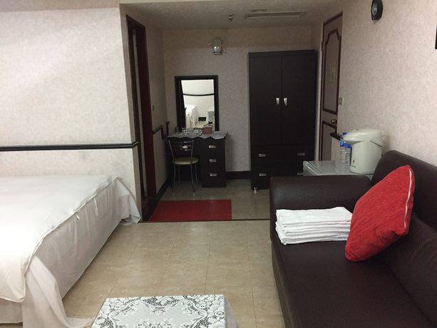 Imagen de la habitación del Hotel King Lo Tung. Foto 16