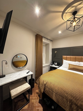 Imagen de la habitación del Hotel King Street Aparthotel. Foto 4