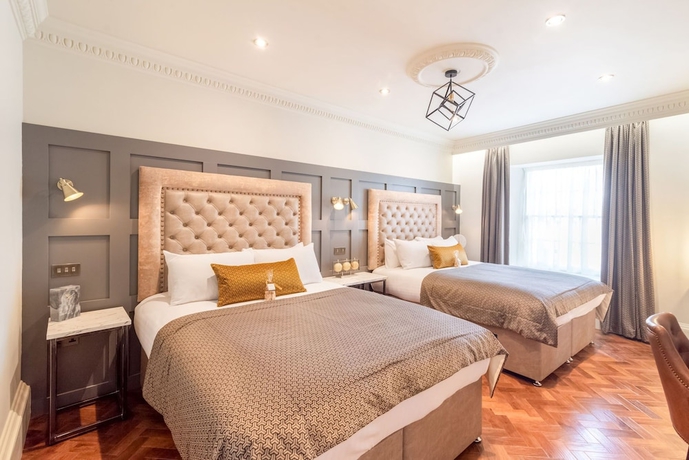 Imagen de la habitación del Hotel King Street Aparthotel. Foto 8
