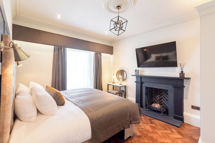 Imagen de la habitación del Hotel King Street Aparthotel. Foto 15