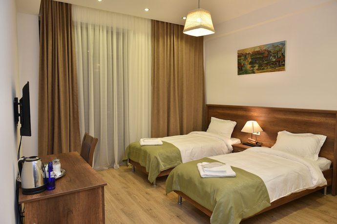 Imagen de la habitación del Hotel King Tom. Foto 17