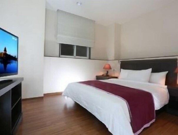 Imagen de la habitación del Hotel King Town. Foto 21