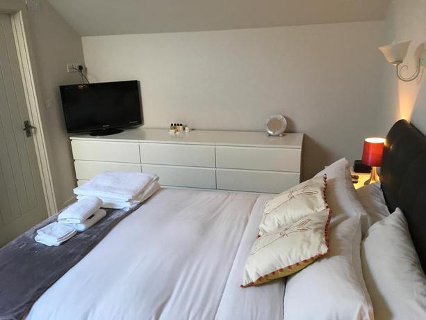 Imagen de la habitación del Hotel King William Cottage. Foto 11