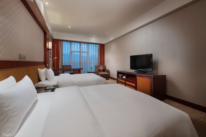 Imagen de la habitación del Hotel King World Chongqing. Foto 2