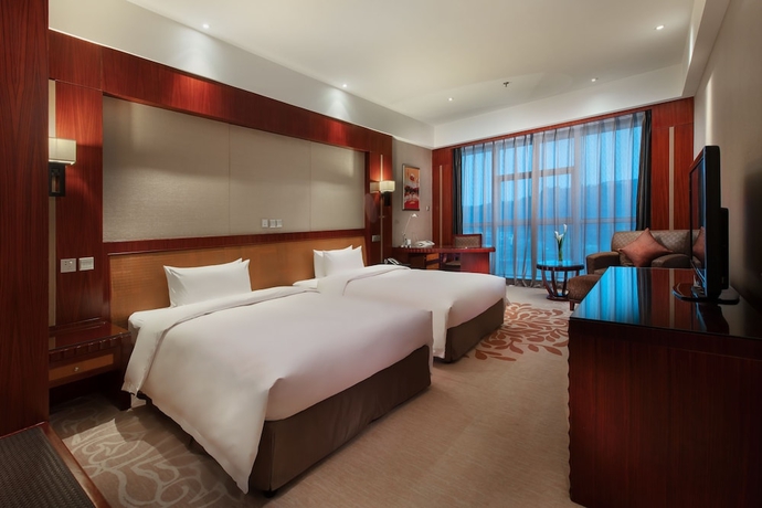 Imagen de la habitación del Hotel King World Chongqing. Foto 3