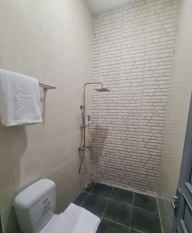Imagen de la habitación del Hotel KingKabba Guest House Wonosobo. Foto 9