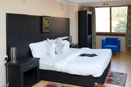 Imagen de la habitación del Hotel Kingdom, Ciudad de Mwanza. Foto 16