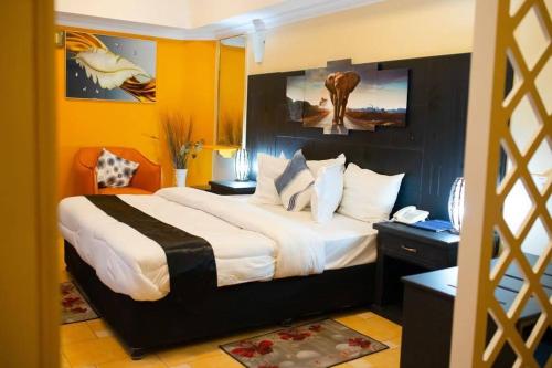 Imagen de la habitación del Hotel Kingdom, Ciudad de Mwanza. Foto 18