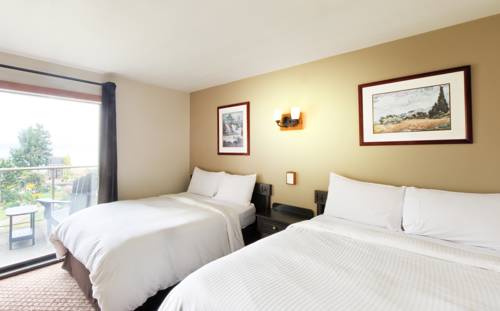 Imagen de la habitación del Hotel Kingfisher Oceanside Resort & Spa. Foto 6