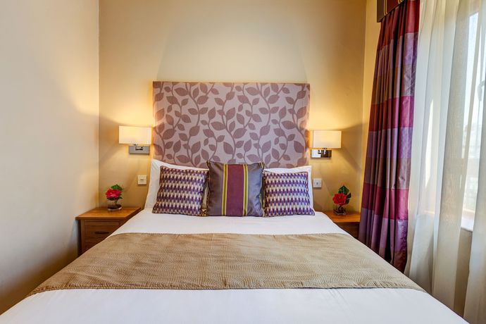 Imagen de la habitación del Hotel Kingfisher Townhouse. Foto 6