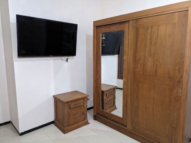 Imagen de la habitación del Hotel Kingkost Kenari Kudus. Foto 13