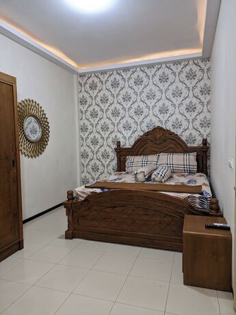 Imagen de la habitación del Hotel Kingkost Kenari Kudus. Foto 15