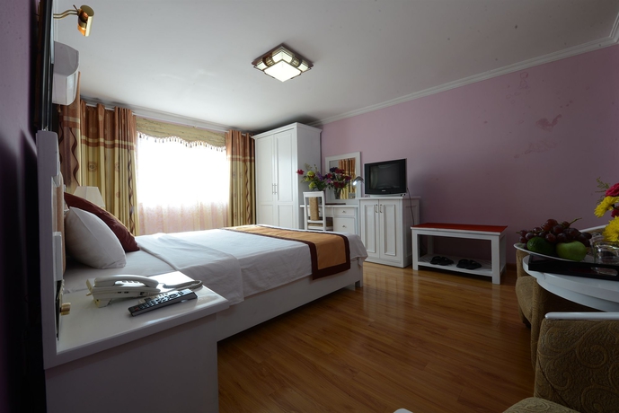 Imagen de la habitación del Hotel Kingly. Foto 12