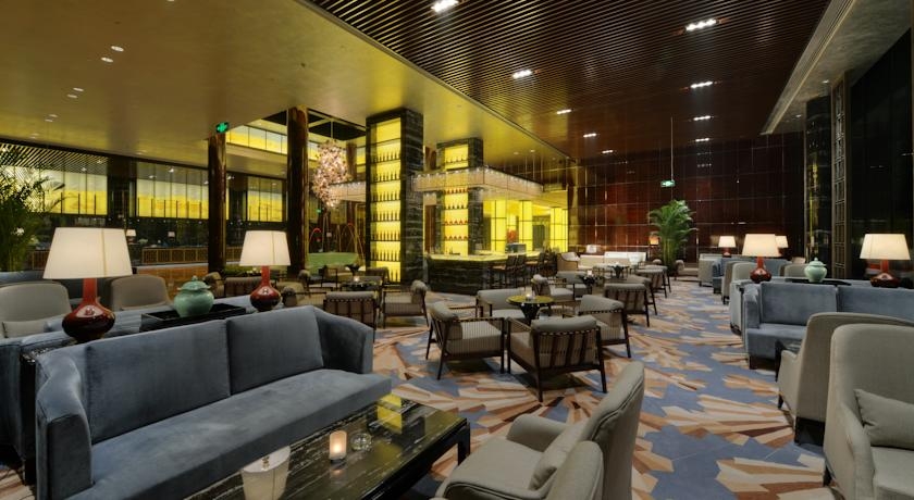 Imagen del bar/restaurante del Hotel Kingrand Hotel Beijing. Foto 2