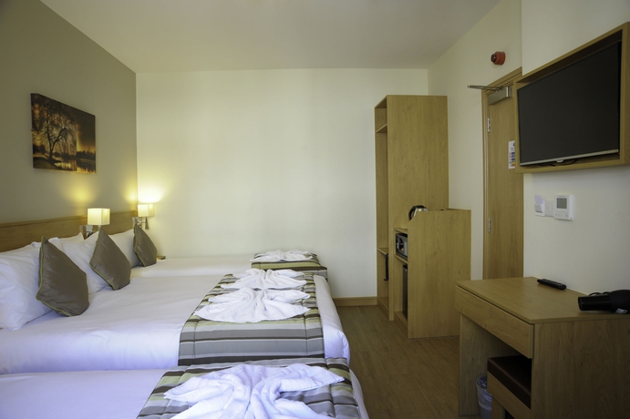 Imagen de la habitación del Hotel Kings Cross Inn. Foto 6