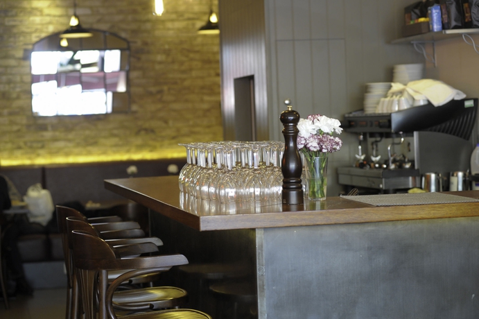 Imagen del bar/restaurante del Hotel Kings Cross Inn. Foto 3