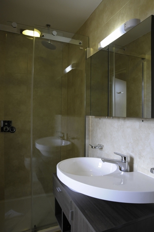 Imagen de la habitación del Hotel Kings Cross Inn. Foto 14