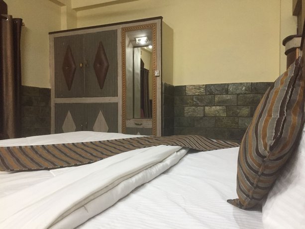 Imagen de la habitación del Hotel Kings Inn, Haridwar. Foto 4