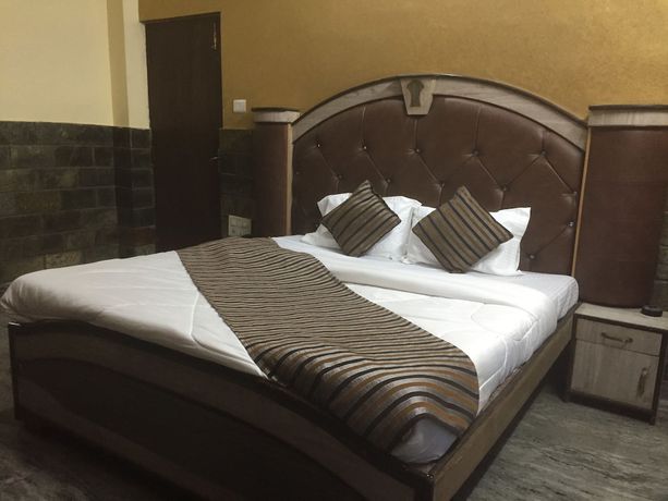 Imagen de la habitación del Hotel Kings Inn, Haridwar. Foto 7