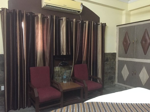 Imagen de la habitación del Hotel Kings Inn, Haridwar. Foto 8