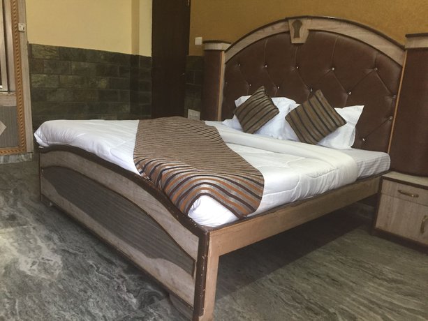 Imagen de la habitación del Hotel Kings Inn, Haridwar. Foto 9