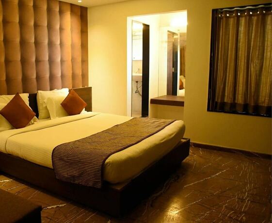 Imagen de la habitación del Hotel King's Kraft Stay Inn Rajkot. Foto 11