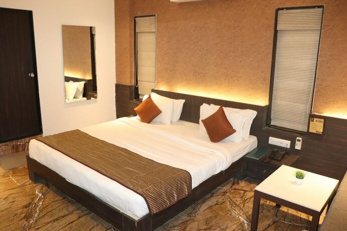Imagen de la habitación del Hotel King's Kraft Stay Inn Rajkot. Foto 13