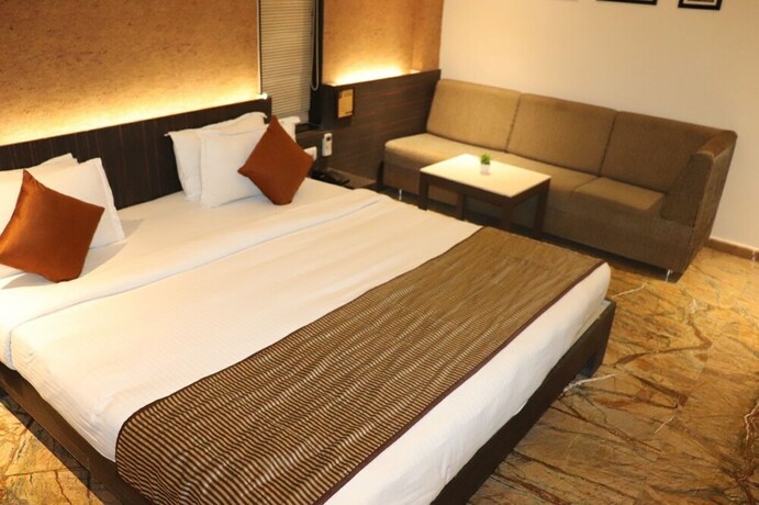 Imagen de la habitación del Hotel King's Kraft Stay Inn Rajkot. Foto 14