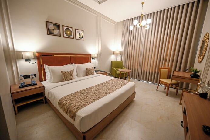 Imagen de la habitación del Hotel Kings Kraft The Park Executive. Foto 18