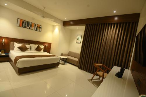 Imagen de la habitación del Hotel Kings Kraft Tremezzo Inn, Somnath. Foto 18