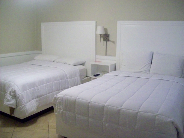 Imagen de la habitación del Hotel Kingsail Resort. Foto 14