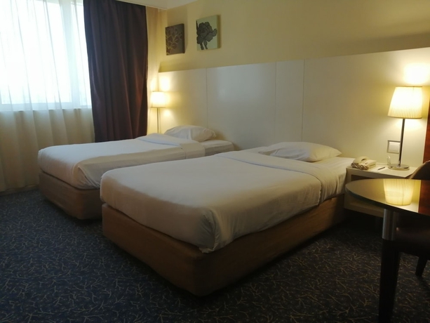 Imagen de la habitación del Hotel Kingsgate Abu Dhabi. Foto 9