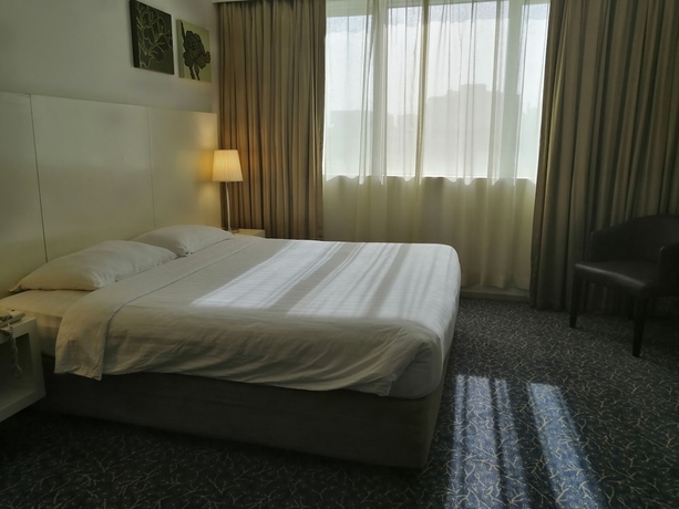 Imagen de la habitación del Hotel Kingsgate Abu Dhabi. Foto 16