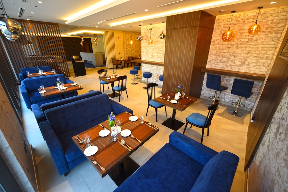 Imagen del bar/restaurante del Hotel Kingsgate Canal Hotel. Foto 1