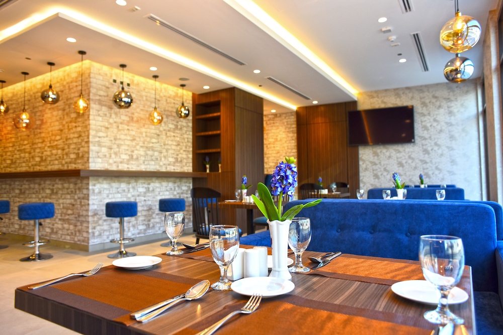 Imagen del bar/restaurante del Hotel Kingsgate Canal Hotel. Foto 6