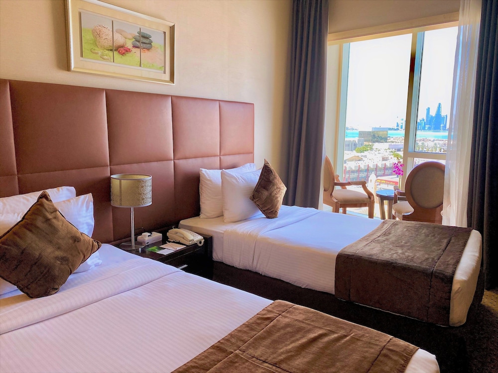 Imagen de la habitación del Hotel Kingsgate Hotel Doha By Millennium Hotels. Foto 15