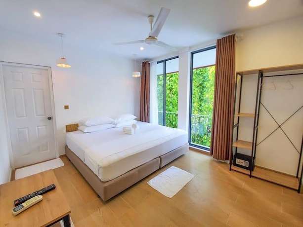 Imagen de la habitación del Hotel Kingsway Thoddoo. Foto 8