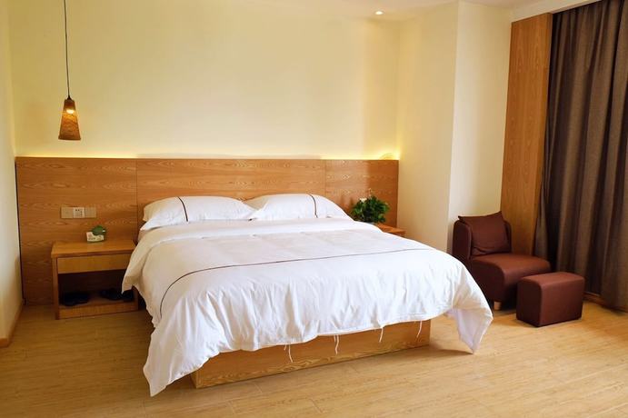 Imagen de la habitación del Hotel Kingtime Hotel. Foto 7