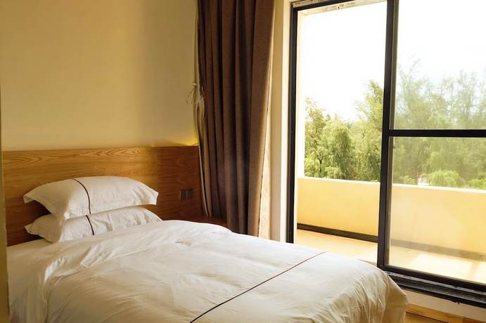 Imagen de la habitación del Hotel Kingtime Hotel. Foto 11