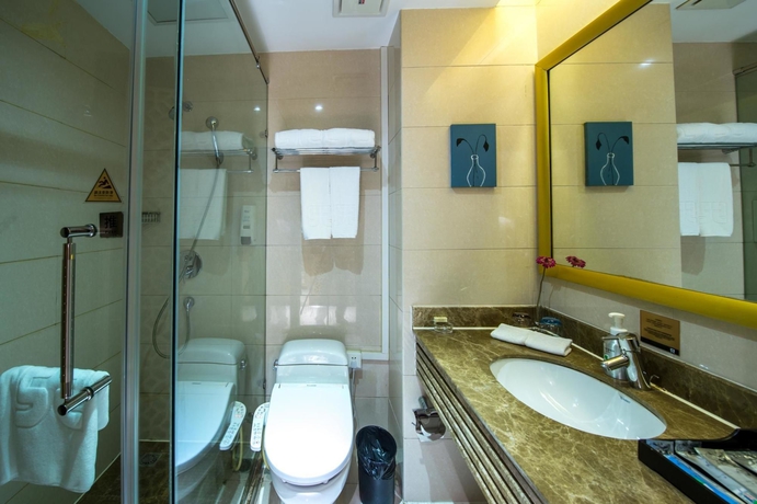 Imagen de la habitación del Hotel Kingtown Hongmei Shanghai. Foto 6
