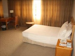 Imagen de la habitación del Hotel Kingwood Inn Kuching. Foto 5