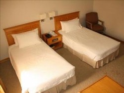 Imagen de la habitación del Hotel Kingwood Inn Kuching. Foto 7
