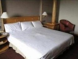 Imagen de la habitación del Hotel Kingwood Inn Kuching. Foto 8