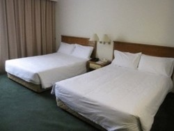Imagen de la habitación del Hotel Kingwood Inn Kuching. Foto 9